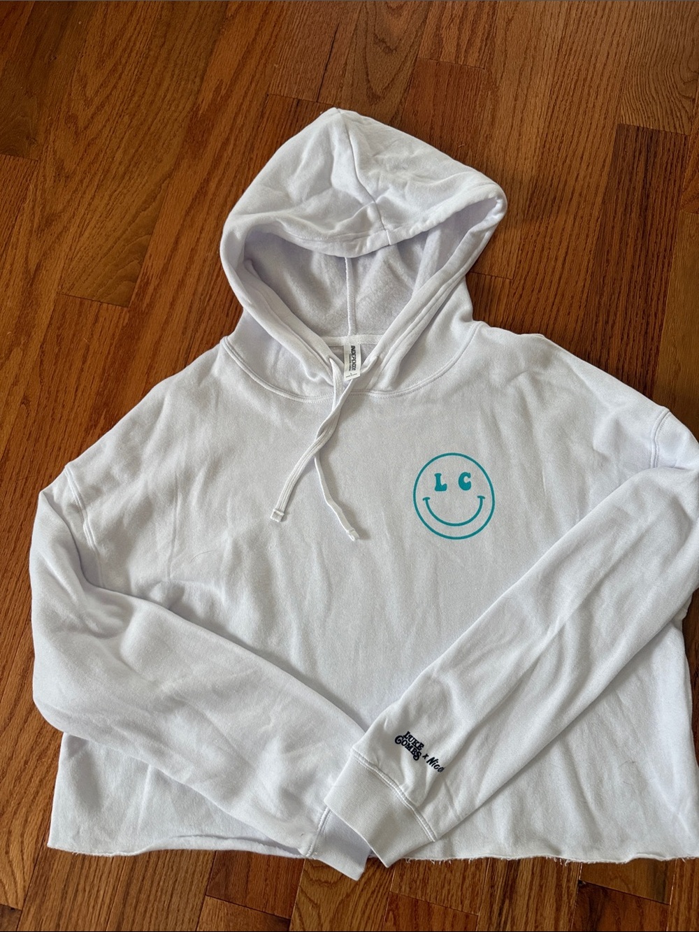 Luke Combs Logo White Cropped Hoodie with Teal Smile Graphic